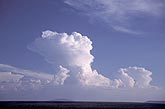 Cloud types, TCu: a line of Cumulus with a towering Cumulus cloud