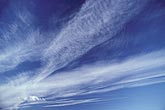Abstract of finely detailed cloud bands in bright blue sky