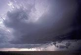 Supercell storm cloud evolution with scud and flanking line