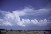 Clouds building along a cold front, becoming Cumulus Congestus