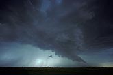 A sharply angled inflow tail feeds a powerful and furious storm