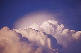 A storm top with a Pileus cap over strong updrafts