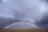 A full rainbow, brighter where spectral colors overlap